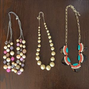 Assorted costume necklaces.